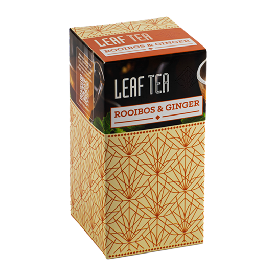 Yellow tea box with orange patterned graphics.