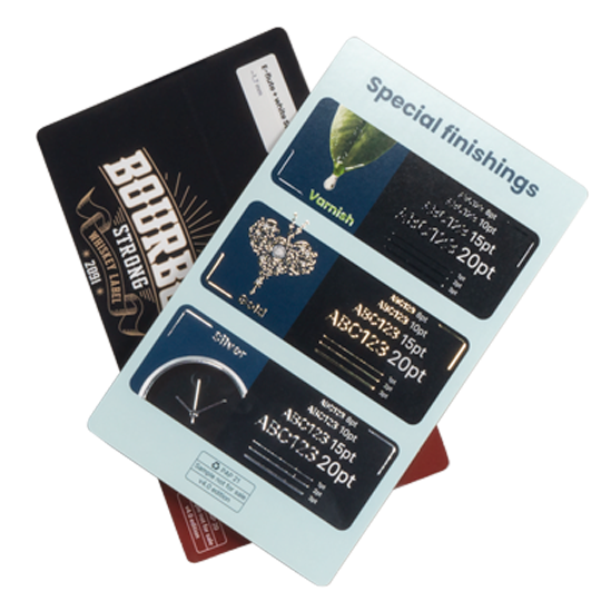 Two cards placed one on top of the other, showcasing special finishes.